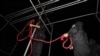 Iranian security officer prepare a hanging rope for an execution. (file photo) 