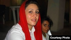 Political prisoner Maryam Akbari Monfared and her daughter, undated. As one of the longest-serving political prisoners in Iran, Monfared has not seen her children since 2010.