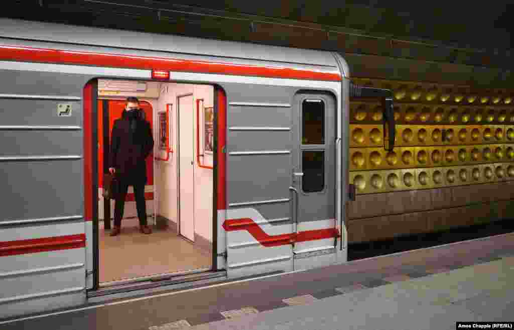 A man in a nearly empty subway car on March 17 in a station near Prague's tourist center. 