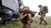 Russian troops take part in drills in Crimea, which Moscow forcibly seized from Ukraine in 2014.